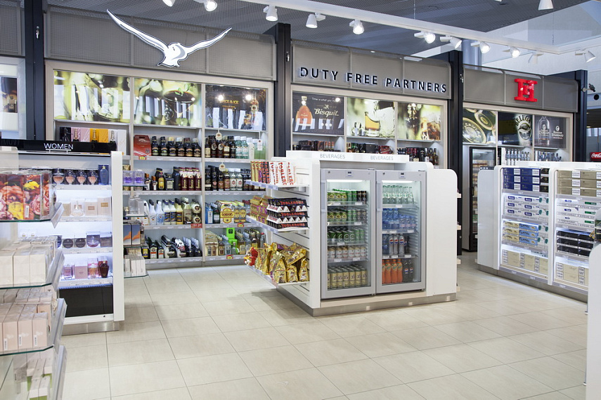 Портфолио торгового оборудования и мебели Duty Free "Partners" напитки, продукты рис. 1