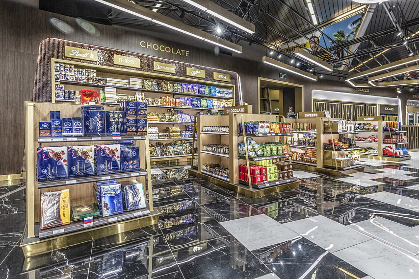 Портфолио торгового оборудования и мебели Duty Free Moscow "Reg Staer" рис. 7